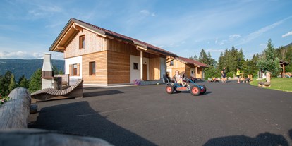 Hüttendorf - zustellbares Kinderbett - Kärnten - Alpen Chalets Hauserhof