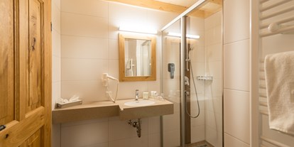 Hüttendorf - Penk (Reißeck) - Eines der Badezimmer im Chalet - EDELWEISS CHALETS Zauchensee
