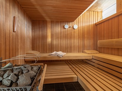 Hüttendorf - Mikrowelle - Finnische Sauna. - Lake Resort Pressegger See