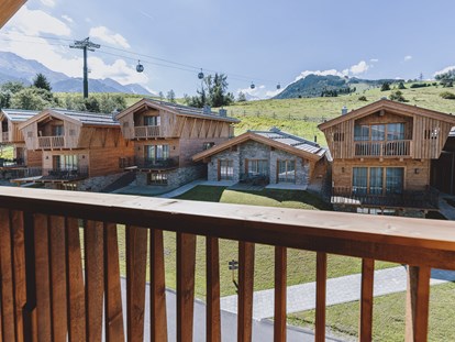 Hüttendorf - Hohe Tauern - Außenansicht unsere Chalets - Bergdorf Hotel Zaglgut Ski In & Ski Out