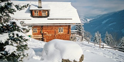 Hüttendorf - Sauna: im Chalet - Kärnten - Almdorf im Winter - Almdorf Seinerzeit