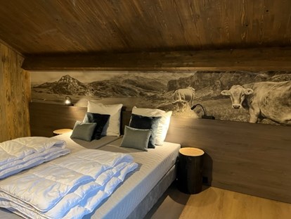 Hüttendorf - Umgebungsschwerpunkt: Berg - Nockberge - Schlafzimmer Chalet Luxe - DualResorts Afritz am See