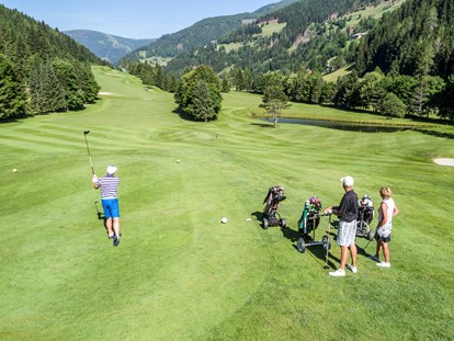 Hüttendorf - Doppelbett - Golfen mit Bergpanorama - Trattlers Hof-Chalets