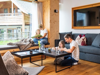 Hüttendorf - Doppelbett - Familienurlaub in den Kärntner Nockbergen - Trattlers Hof-Chalets